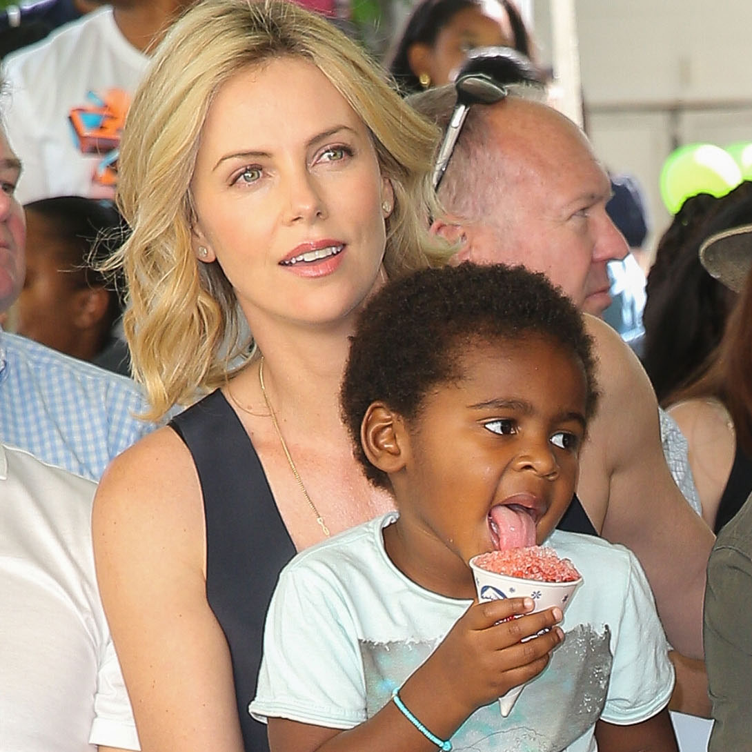 charlize theron children age        
        <figure class=