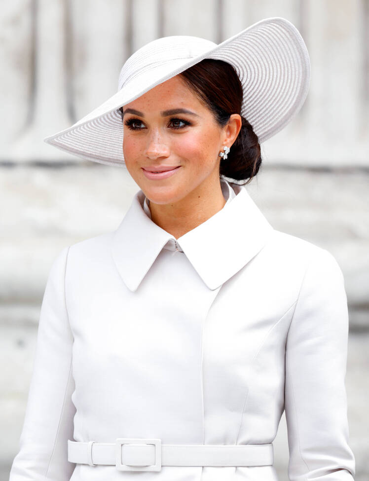 Meghan Markle wears white hat and white outfit
