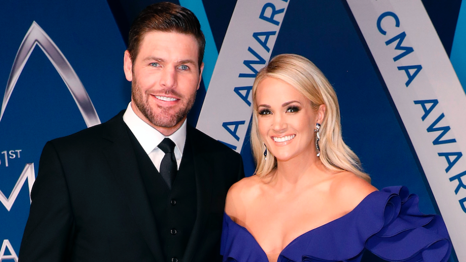 Carrie Underwood is joined by husband Mike Fisher on the red carpet at the  CMA Awards, where she will be participating in three separate
