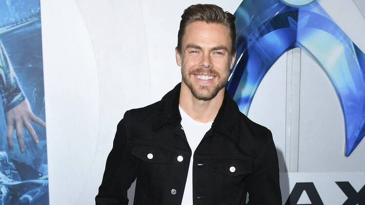 derek-hough-aquaman-premiere-black-jacket-white-shirt-brown-pants