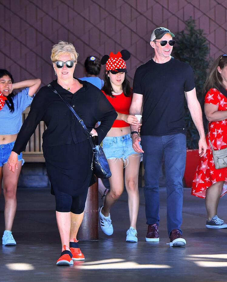Hugh Jackman and family enjoy a day at Disneyland in Anaheim, CA