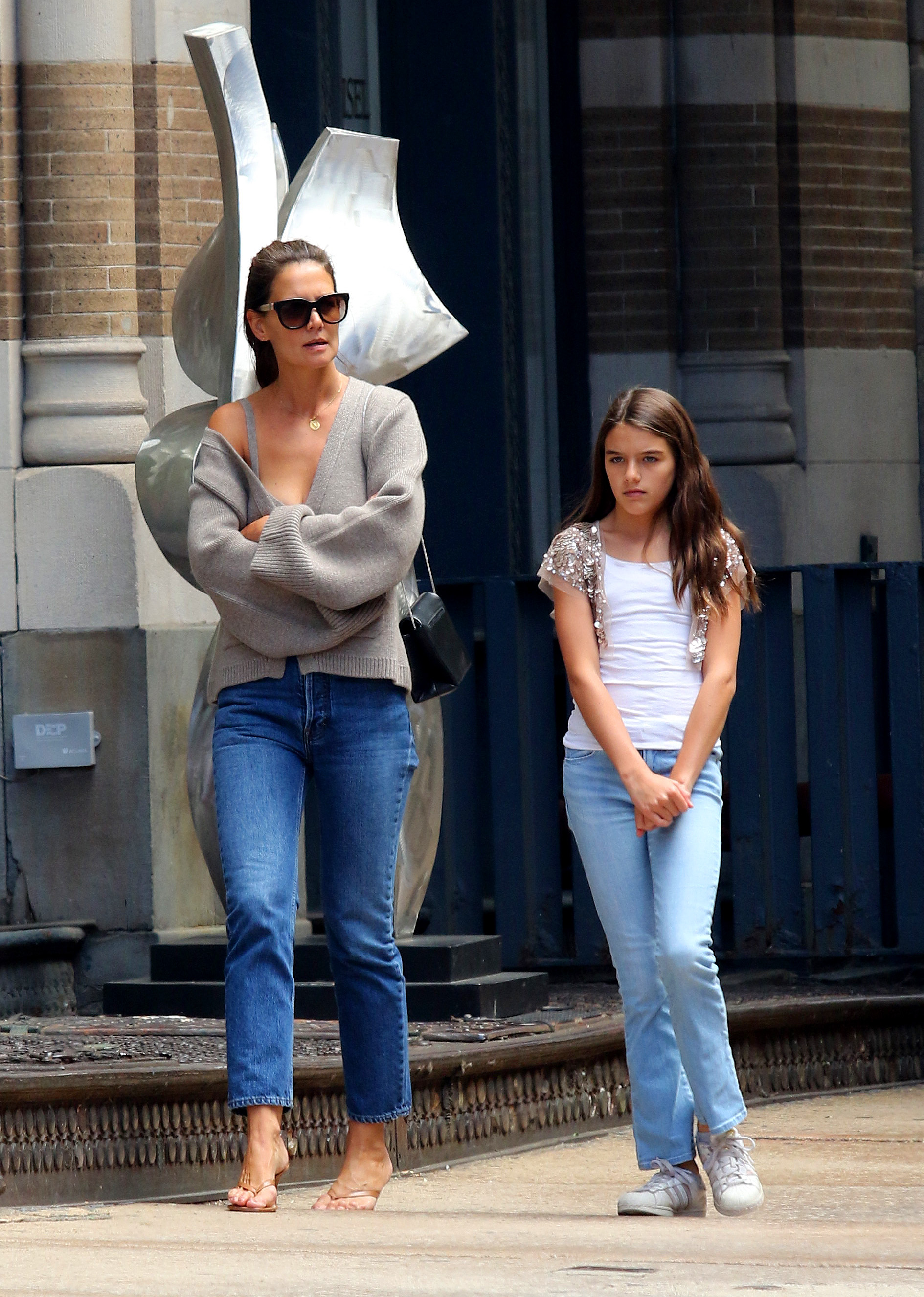 Katie Holmes and Daughter Suri Cruise Hail Cab in NYC Photos