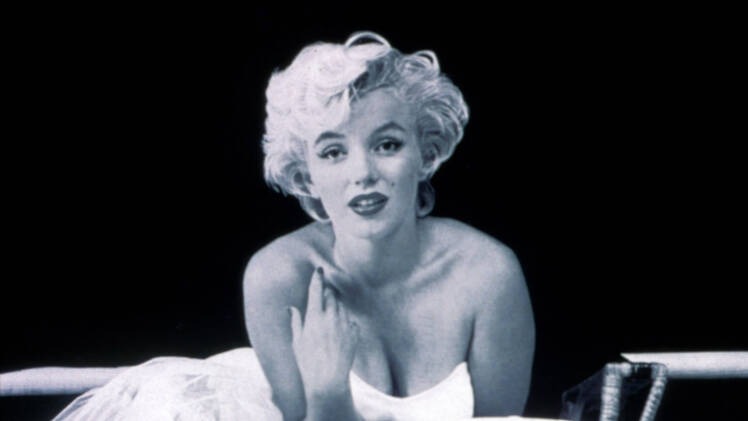 Marilyn Monroe Black and White Photo of Actress in a White Dress