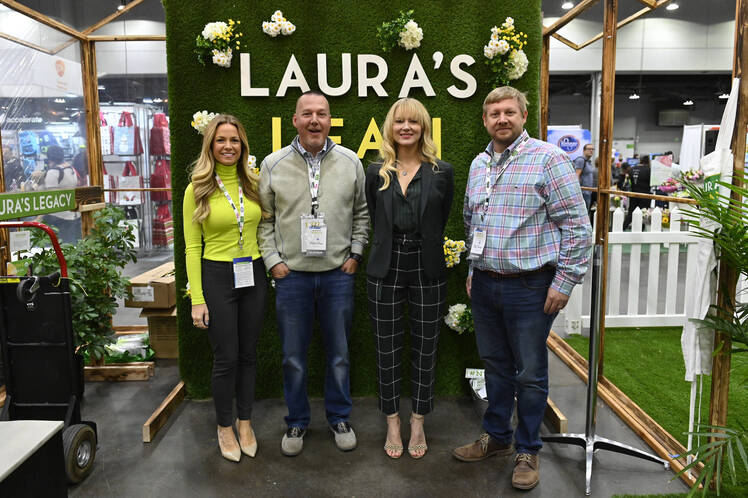 Singer-songwriter Jewel and Community Engagement Manager, Kroger Health Jane Diekers visits vender booths during day 2 wellness your way festival 2019