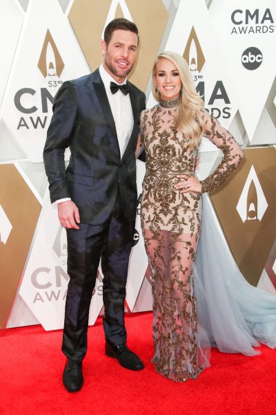 Carrie Underwood och Mike Fisher på CMAS 2019 röda mattan