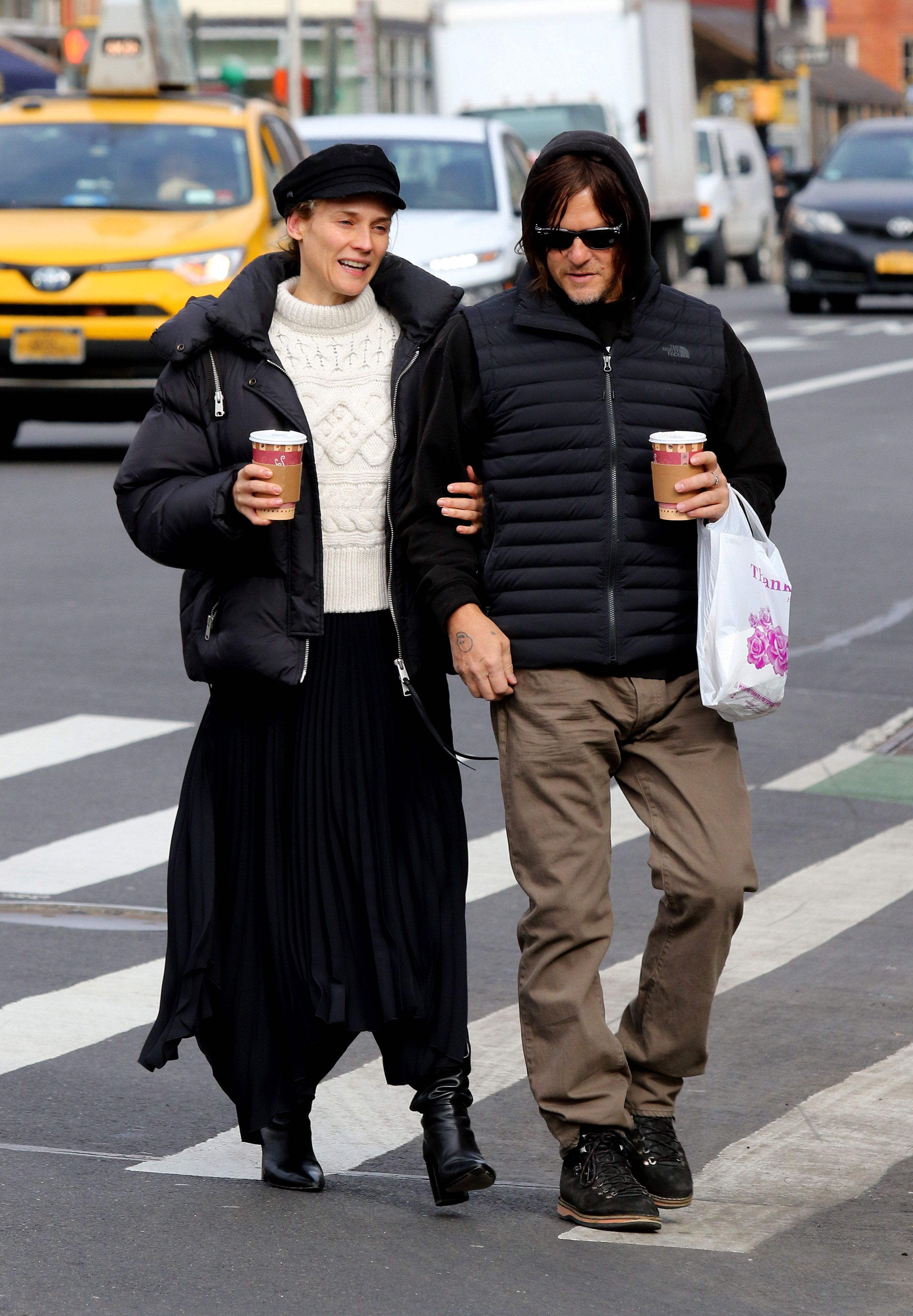 Diane Kruger enjoys a stroll with her partner Norman Reedus and their  daughter in NYC