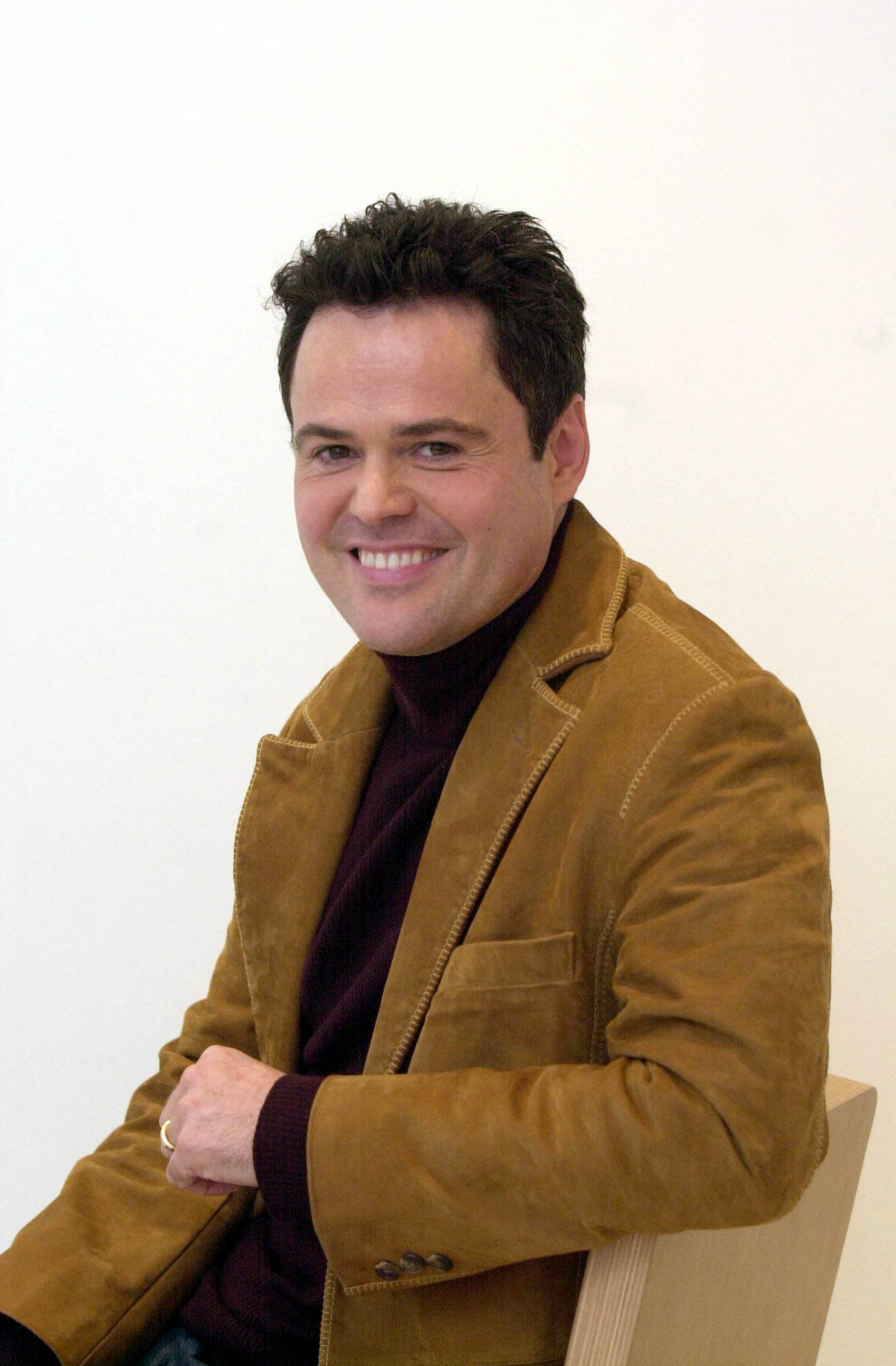 Donny Osmond's Transformation Photos of the Singer Then and Now