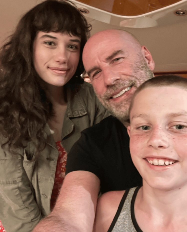 John Travolta Smiles in Rare Photo With Kids Ella and Benjamin