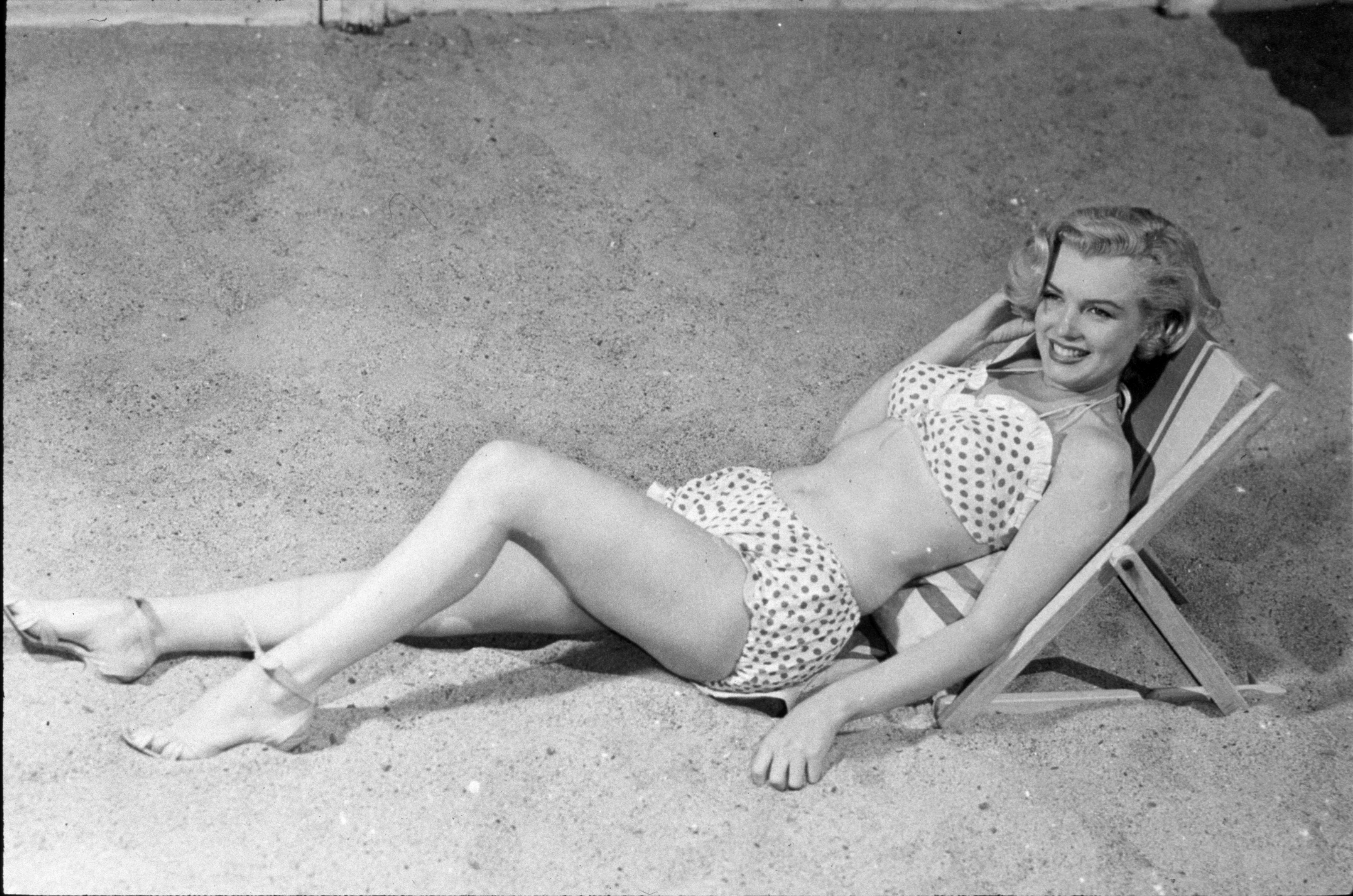 Marilyn Monroe in white bathing suit