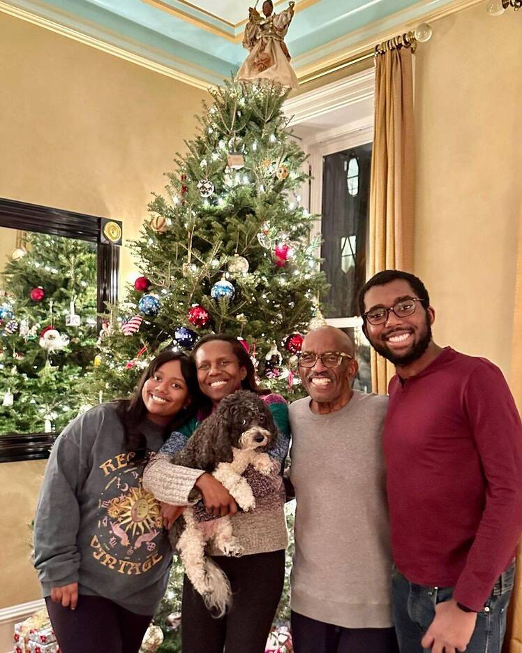 Al Roker and kids Leila and Nicholas pose in front of Christmas tree