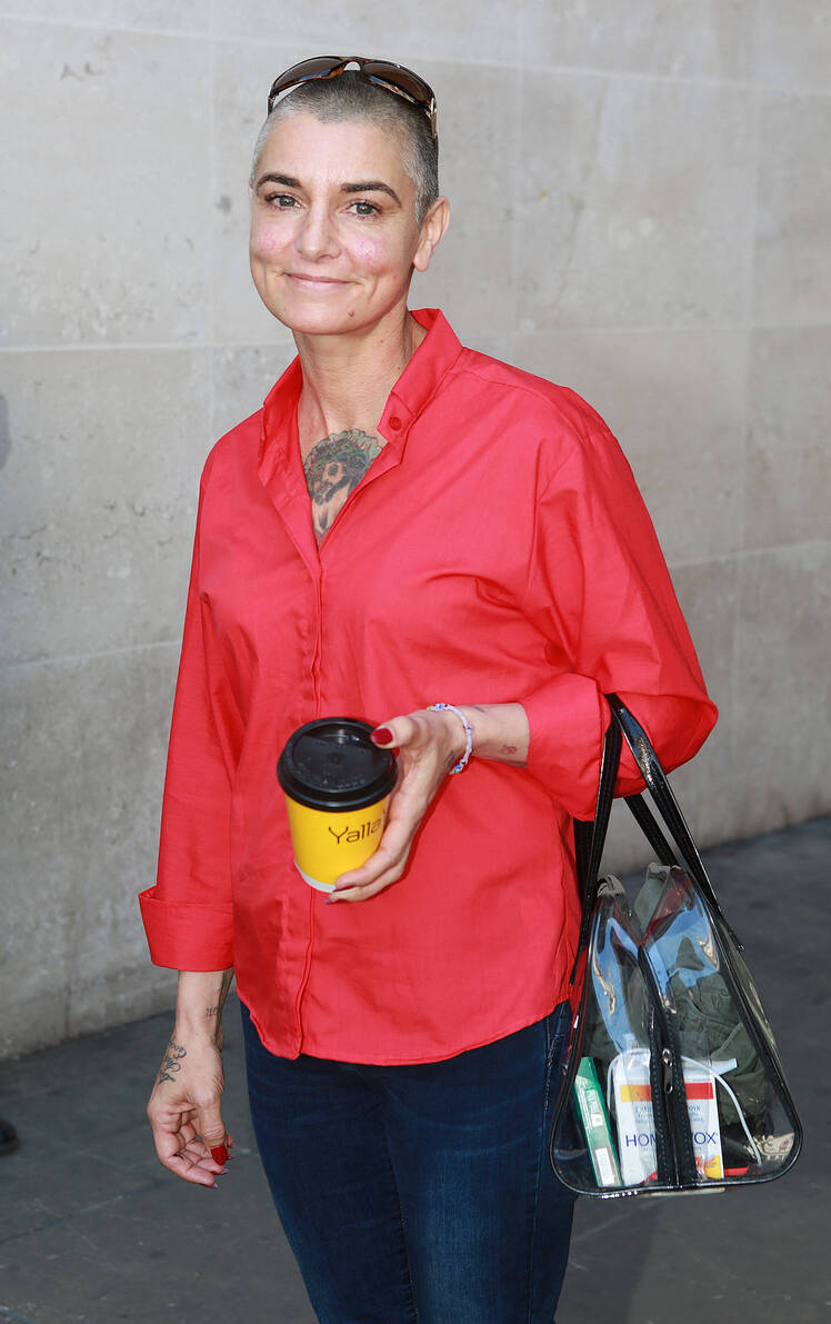 Sinead O'Connor weaars red shirt at BBC radio station