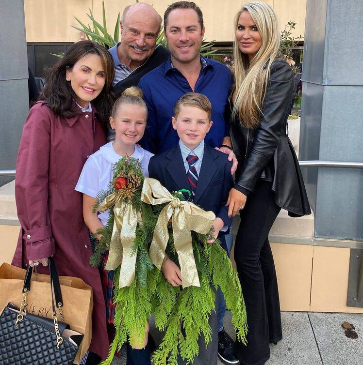 Dr. Phil and Robin McGraw pose with son Jay and grandkids