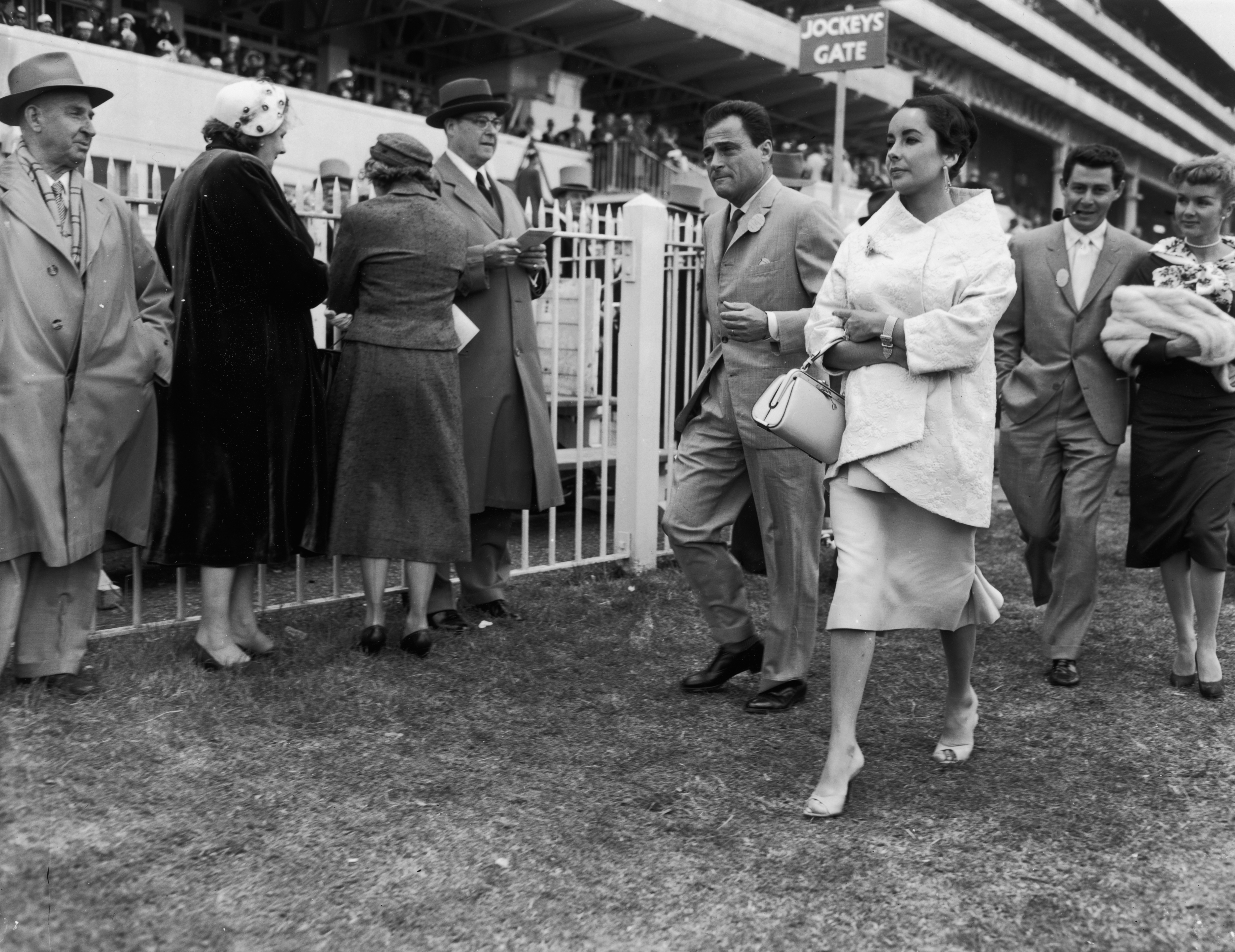 Elizabeth Taylor, Mike Todd, Debbie Reynolds and Eddie Fisher attend derby event