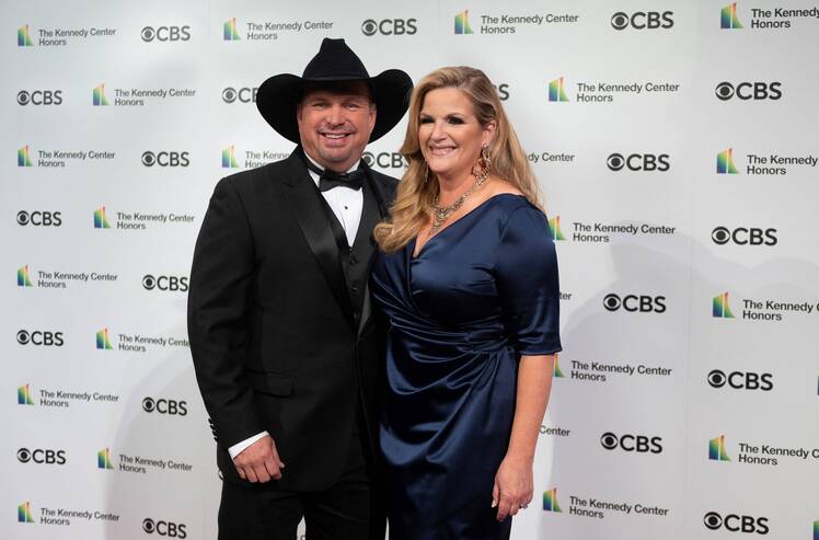 Garth Brooks and Trisha Yearwood posed next to one another at the 43rd Annual Kennedy Center Honors.