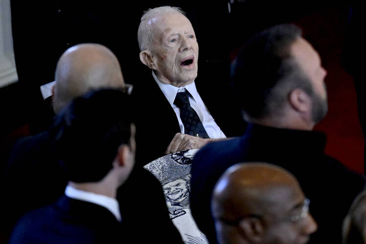 Jimmy Carter arrives for a tribute service for former US First Lady Rosalynn Carter