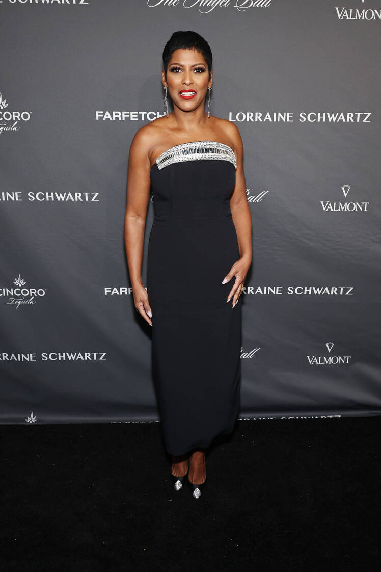 Tamron Hall wears strapless black dress