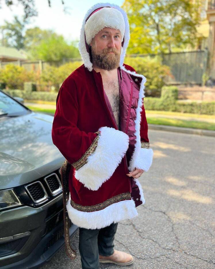 Ben Napier wearing a Santa Claus costume