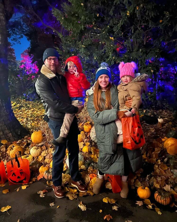 Mina Starsiak Hawk poses with husband Steve Hawk and kids Jack and Charlotte
