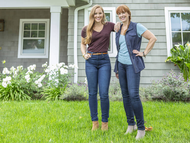 Mina Starsiak Hawk stands in front of house with mom Karen E. Laine