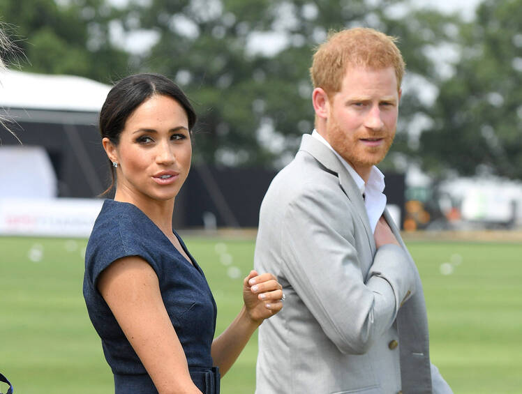 Prince Harry and Meghan Markle walking together