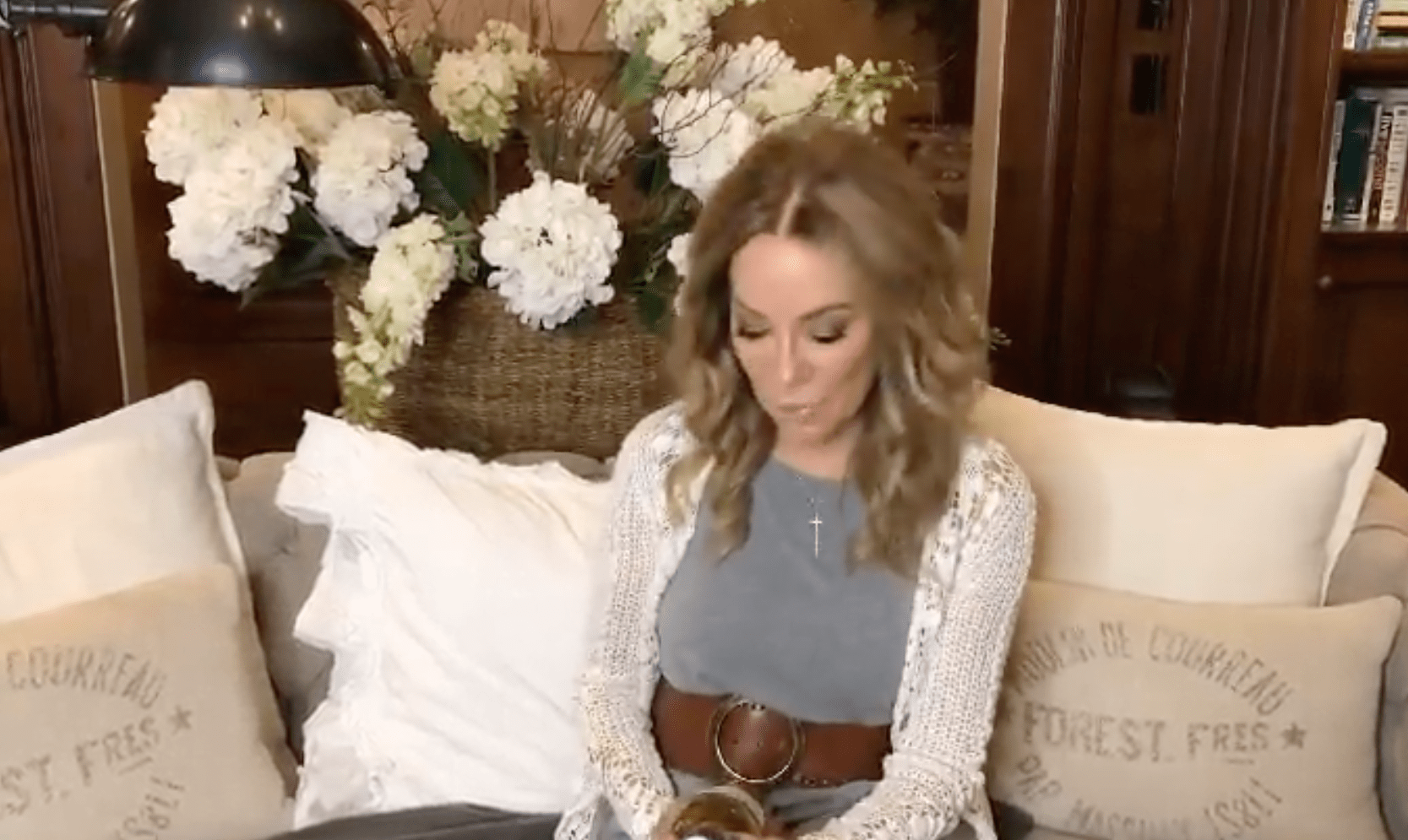 Kathie Lee Gifford sitting in her living room at home