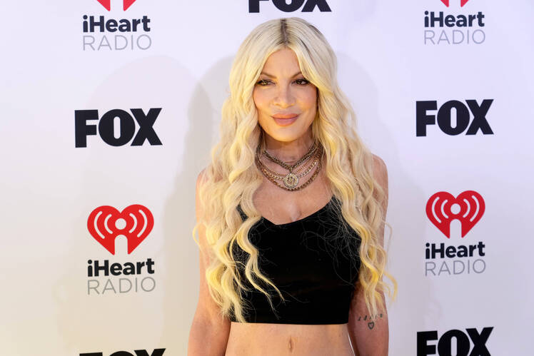 Tori Spelling Says She 'Hit It Off' With John Corbett and Shared Kiss