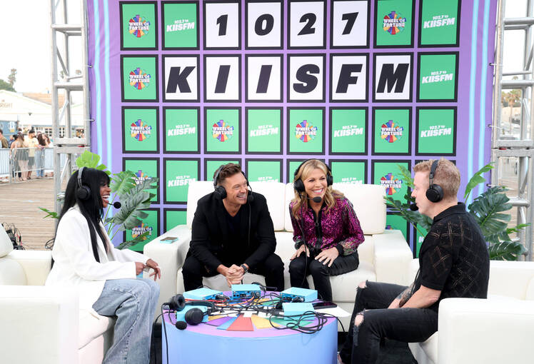 Ryan Seacrest Put In Headlock by Contestant on Wheel of Fortune